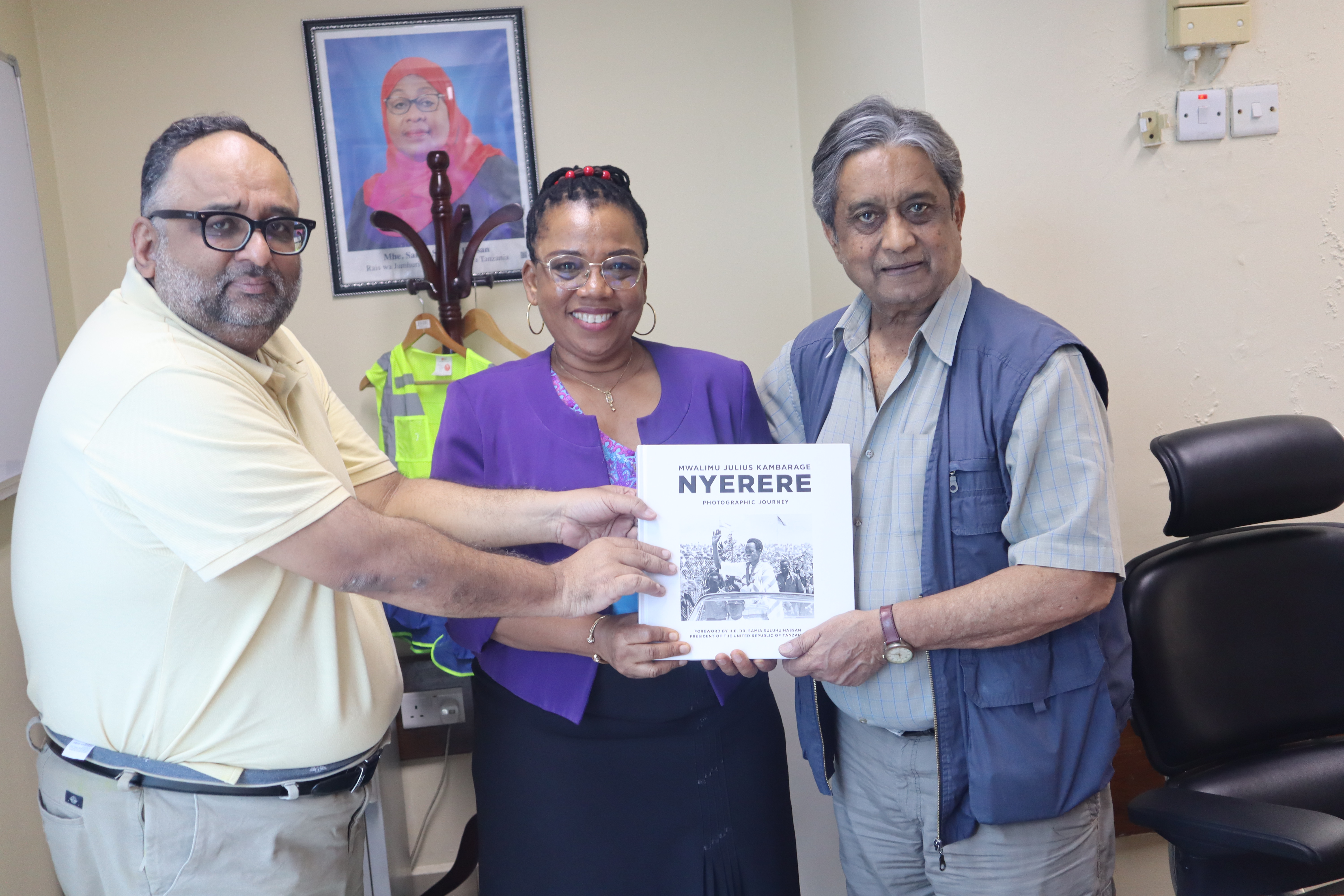 TSN Director receives Nyerere Photo Journey Book
